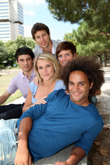 Group of happy students in a park