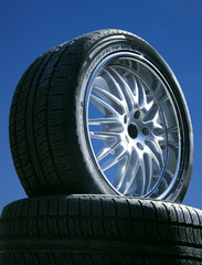 Set of tires in front of blue sky