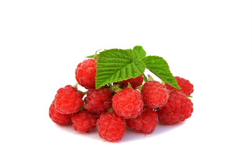 Raspberry with green leaf isolated on the white