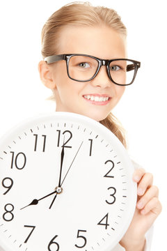 picture of girl holding big clock