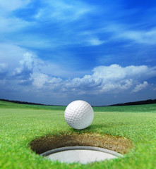 golf ball on lip - obrazy, fototapety, plakaty