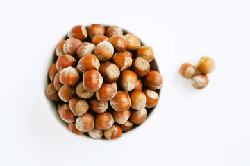 a bowl full of hazelnuts