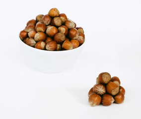 a bowl full of hazelnuts