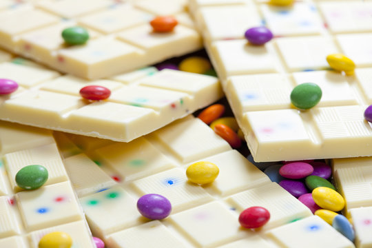 still life of white chocolate with smarties