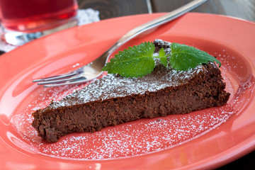 Chocolate cake with ricotta and mint