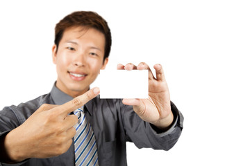 young smiling businessman show business card