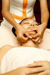 Fototapeta na wymiar Face Massage at Facial Treatment
