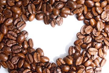 Background heart of coffee grains