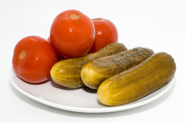 Homemade salted tomatoes and cucumber