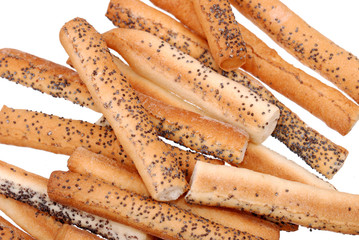 Salted breadsticks with poppy seed isolated on white