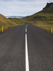 road curling through an icelandic landscape