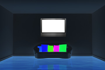 dark room with black couch with colored cushion and LCD tv