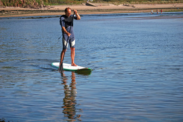 paddle boarder