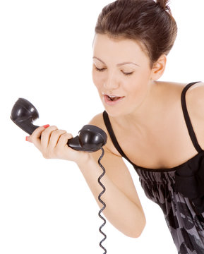 young alluring girl calling at the phone
