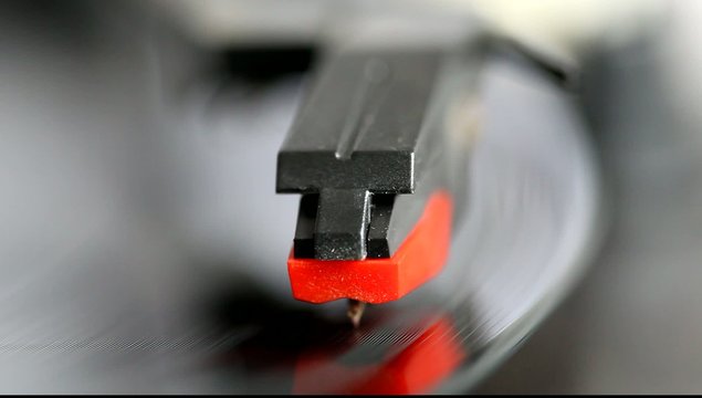 Needle on a spinning record player
