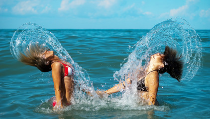 GIRLS IN THE SEA