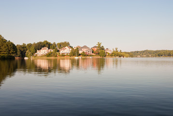 Fototapeta na wymiar Luxury houses on a lake