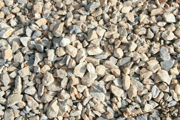 Pebble and small rock on the ground.