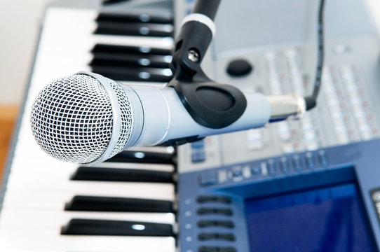 microphone and piano keyboard close-up