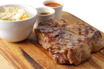 meat and sause on a cutting board