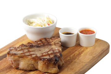 meat and sause on a cutting board
