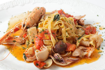 pasta with shrimp on a plate.