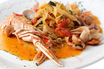 pasta with shrimp on a plate.