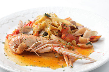 pasta with shrimp on a plate.