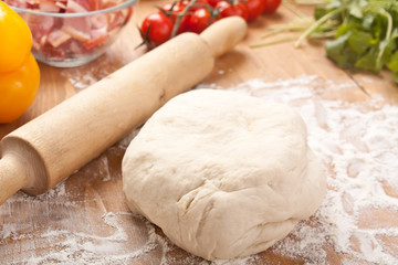 dough and ingredients for pizza