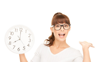woman holding big clock