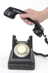 Hand holding receiver of retro phone