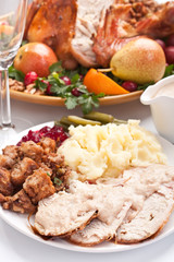 Sliced turkey breast with mashed potatoes and stuffing