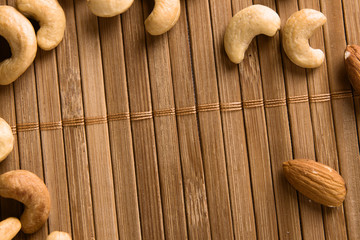Nuts on bamboo background