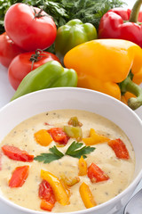 serving of cheese and vegetable cream soup