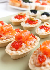large group of canape with salmon and caviar