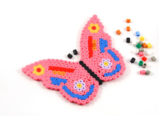 Butterfly of a beads, produced by children