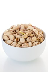 Pistachios in a white bowl