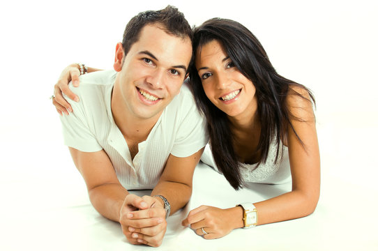 Happy smiling couple in love, over white background