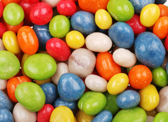 Multicolored sweets covered with glaze