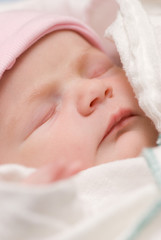 Fototapeta na wymiar Peaceful Sleeping Newborn Baby
