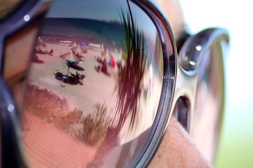 sunglasses reflection on the beach