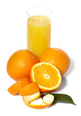 Orange juice and oranges on a white background.