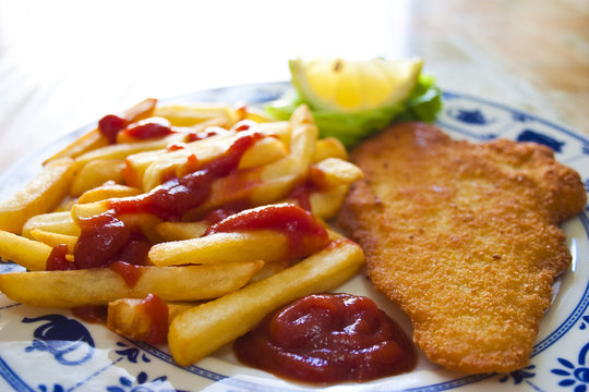 Sogliola impanata e patatine fritte