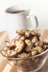 Stack of cookies and cup of tea