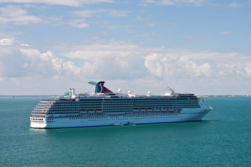 Luxury Fun Ship Sailing on a Green Sea