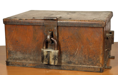 Vintage strongbox of brown color with the lock.