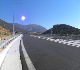 Mountain landscape - empty highway .Mountain road