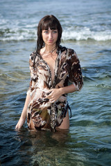 Fototapeta premium Young woman in the ocean water