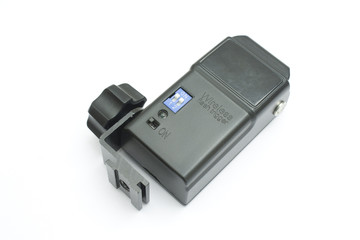 One black wireless flash receiver for a SLR camera