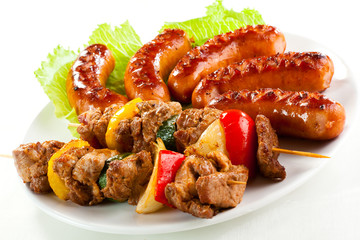 Grilled meat, sausages and vegetables